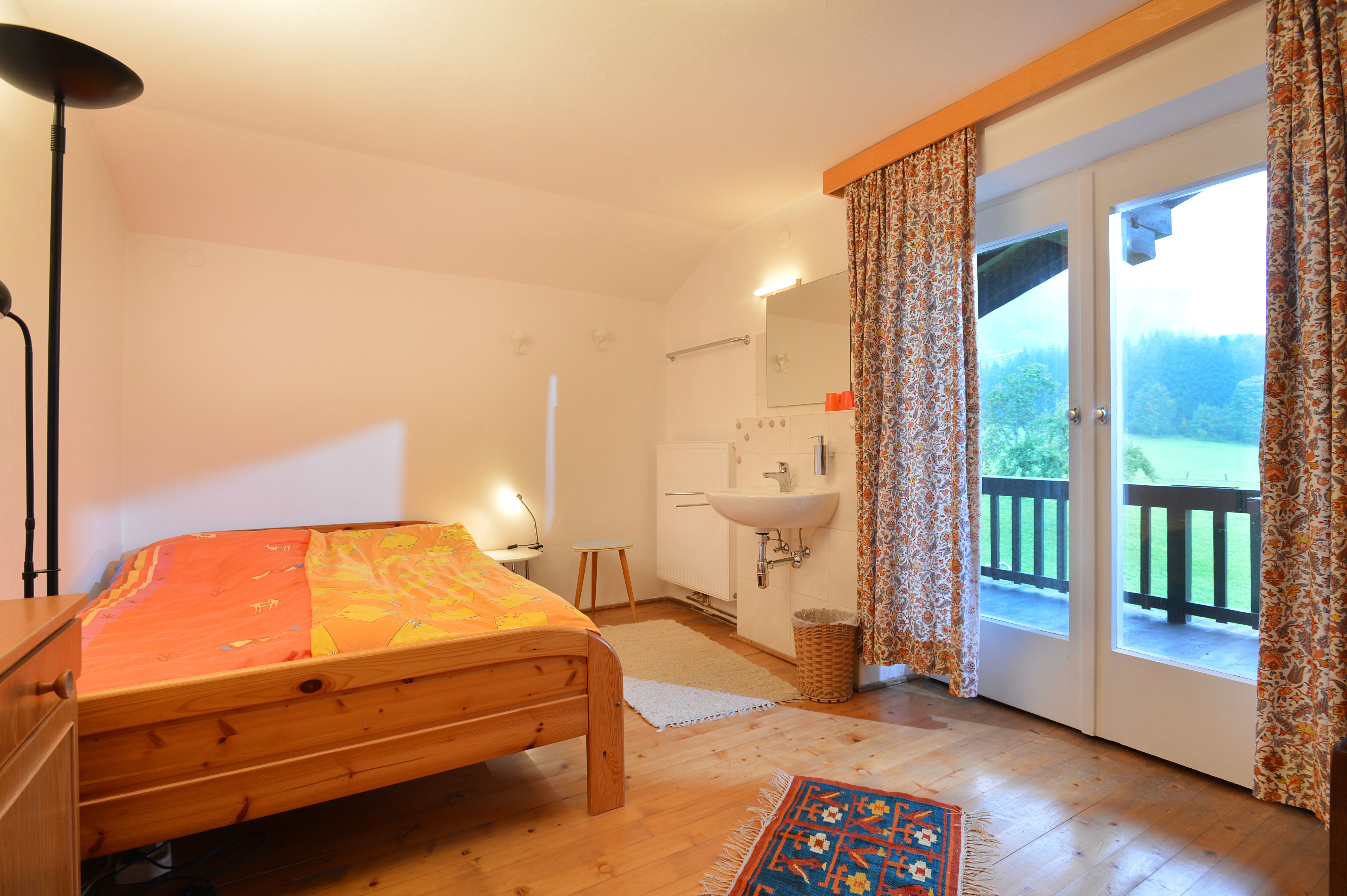 Ferienwohnung-Sonnseite-Going-Aschauerweg-75-Susanne-Martin-Schlafzimmer